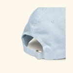 Portraits de Famille Dar VIda The Cap Pasión Pastel Blue Organic Cotton Back Side