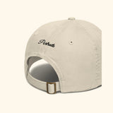 Portraits de Famille The Essentials The Cap Question Gentle Beige Organic Cotton Side